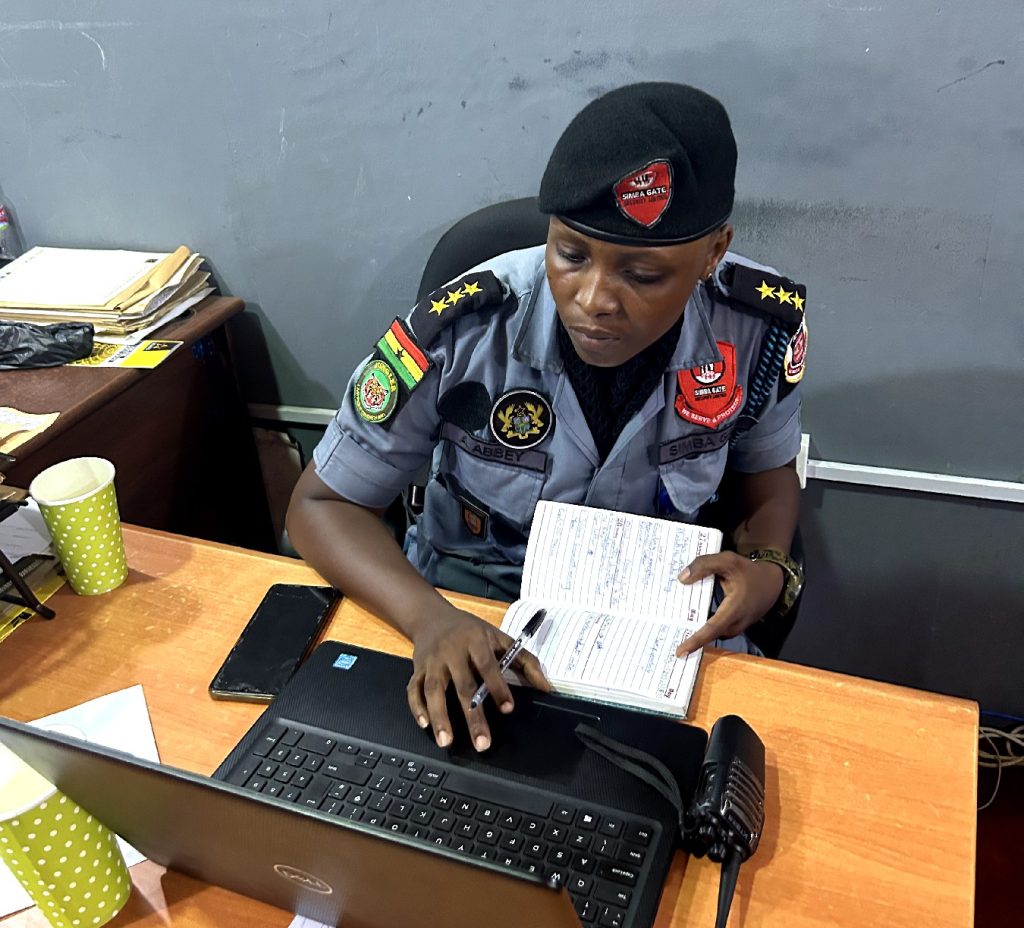 A Simba Gate security employee engaging in customer service